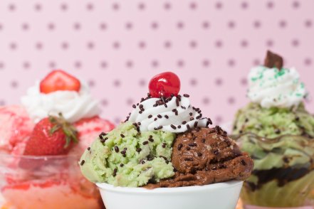 three bowls of assorted ice cream