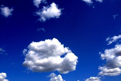 Puffy Clouds Blue Sky